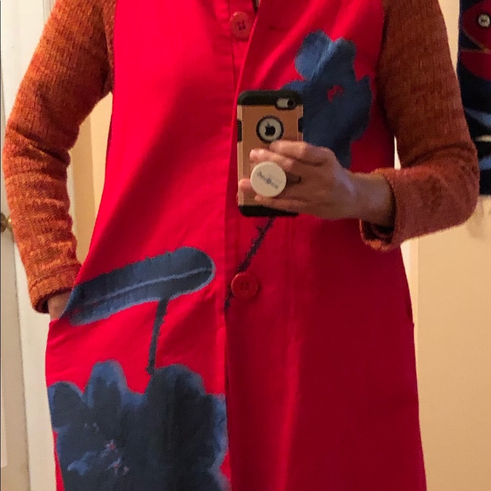 Red below knee-length jacket